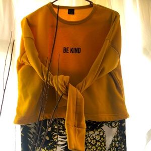 Crop top, pineapple pocketed pants & wedges.